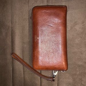brown leather Fossil wristlet/clutch